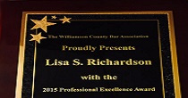 Attorney Lisa Richardson, 2015 award winner, with Williamson County Bar President, Laura Barker.