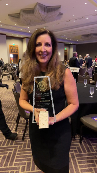 Lisa Richardson was awarded with The Nancy Garms Memorial Award